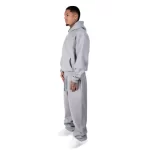 person wearing grey nofs hoodie side view