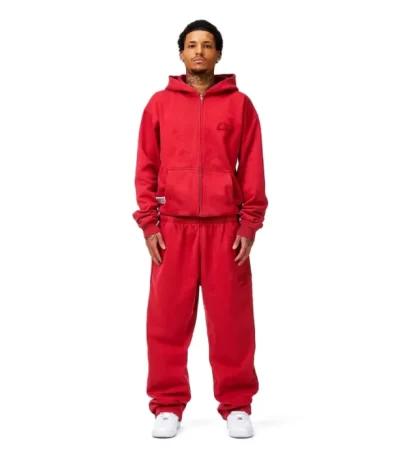 Person wearing red nofs joggers urban style