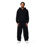 person wearing black nofs hoodie urban style