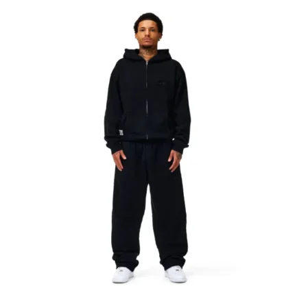 person wearing black nofs hoodie urban style